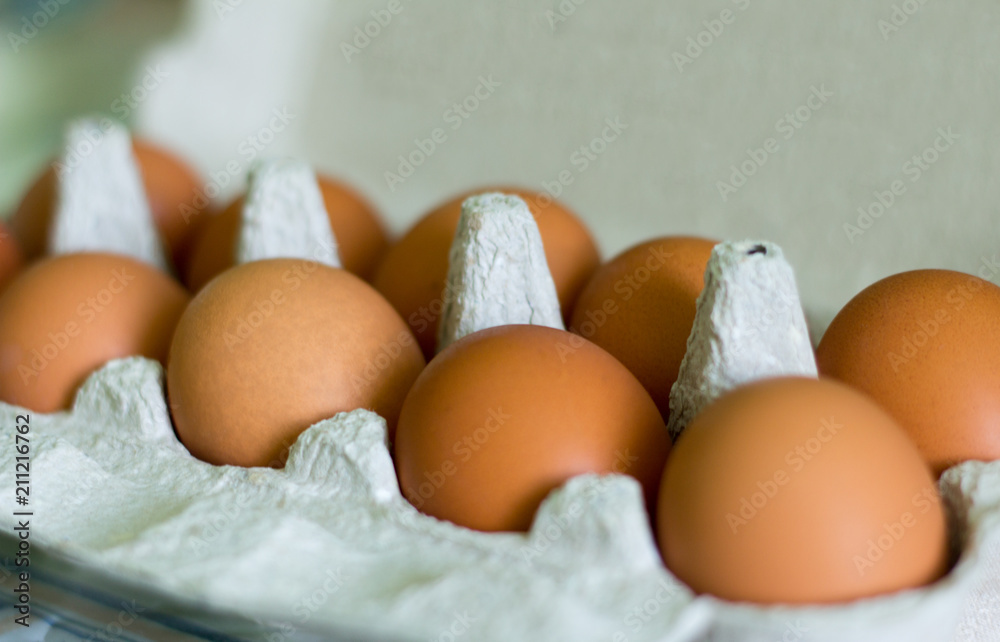 chicken yellow eggs in a cardboard box chicken yellow eggs in a cardboard box