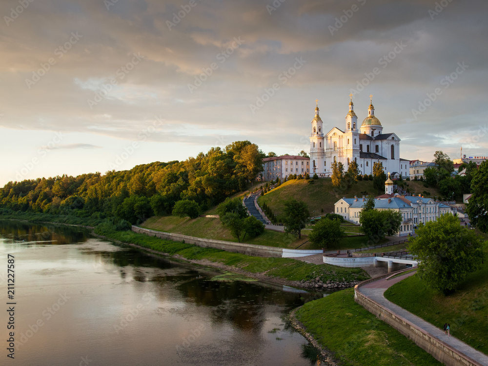 Fototapeta The city of Vitebsk and the Dvina river at sunset
