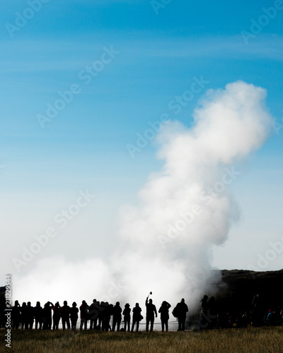 Many people watching Strukkor geyser Iceland