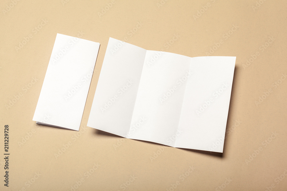 Blank paper pieces for mock up on a beige background Blank paper pieces for mock up on a beige background
