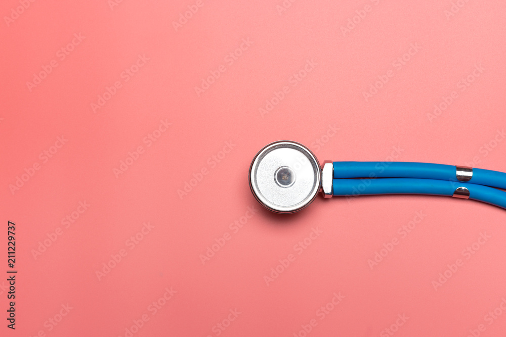 Top view of stethoscope on pink background. Flat lay and copy space. Medical Concept. - obrazy, fototapety, plakaty 