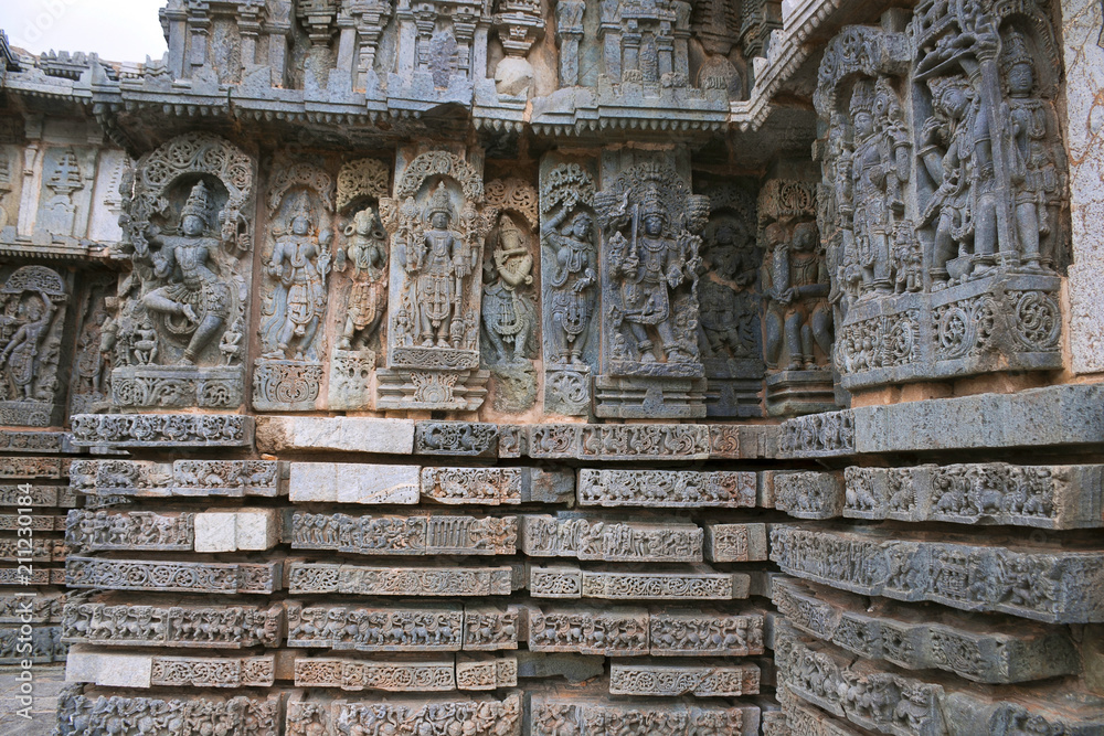 Ornate bas relieif and sculptures of Hindu deities, Kedareshwara Temple, Halebid, Karnataka