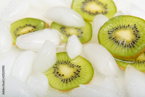 Sliced fresh Kiwi fruit arranged on ice