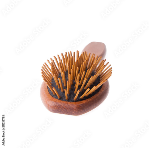 Wooden old comb on blackground