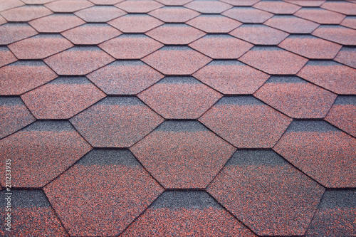Soft roof, roof tiles. Flexible shingles. Roof tiling texture. Flexible, soft, bituminous, composite