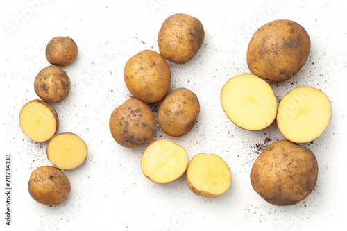 Fotografiet Fresh Organic Potatoes Isolated on White Background