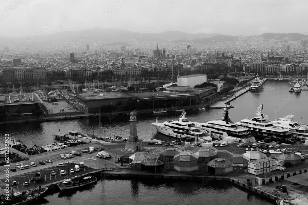 Barcelona, Spain. View from above of the old lighthouse and port. Black and white photo.