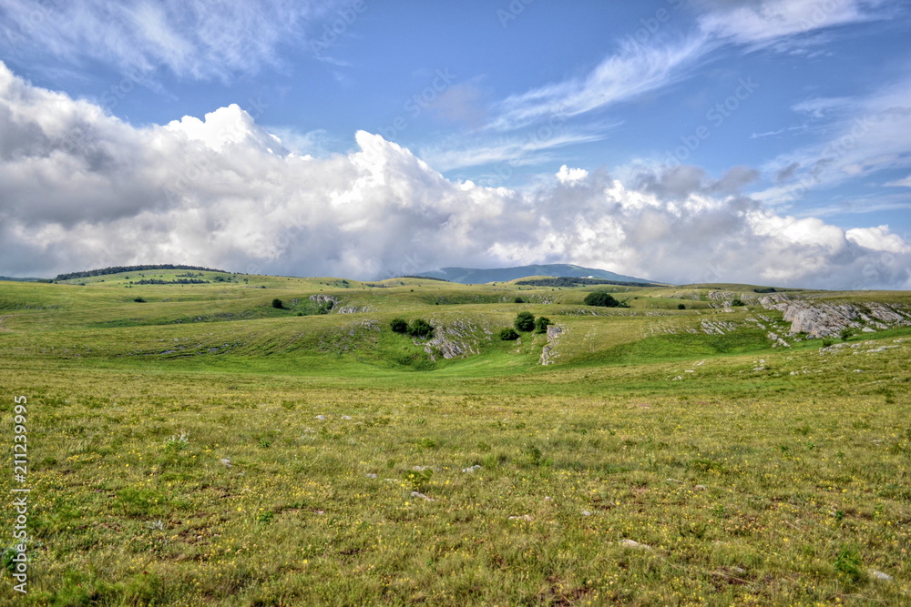 The mountainous green landscape The mountainous green landscape