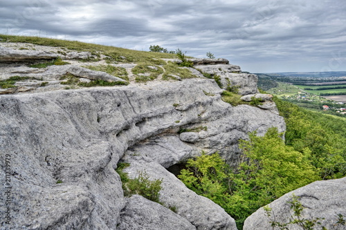 Cloudy weather, mountains on the background gray clouds