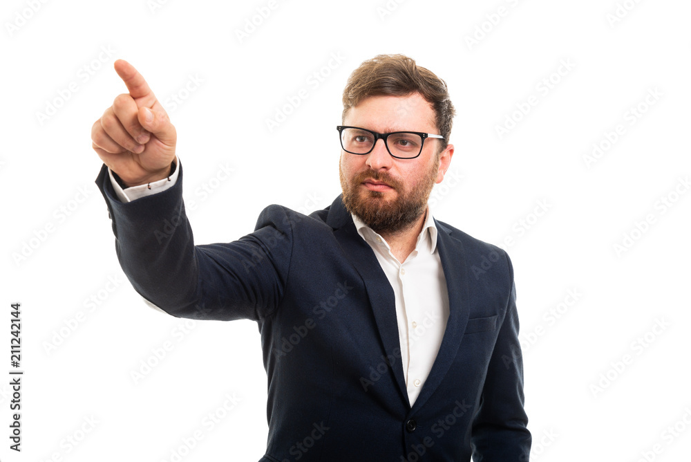 Portrait of business man pointing invisible touchscreen gesture. Portrait of business man pointing invisible touchscreen gesture.