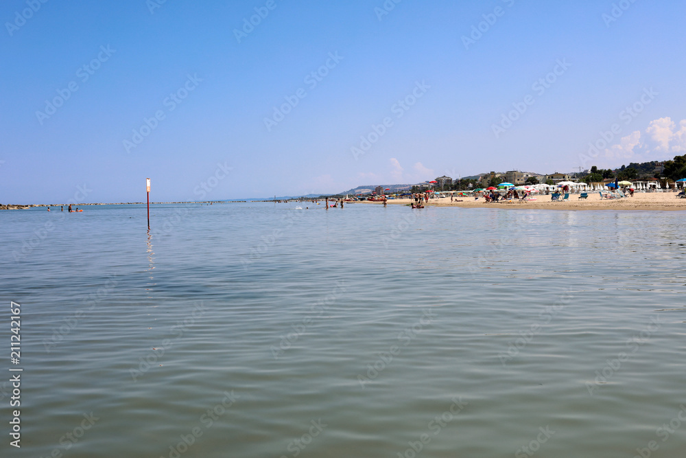 Fototapeta premium Beach of Roseto degli Abruzzi, Abruzzo, Italy. Roseto degli Abruzzi is also known as the 'Lido delle Rose' because of the great variety of roses and oleanders