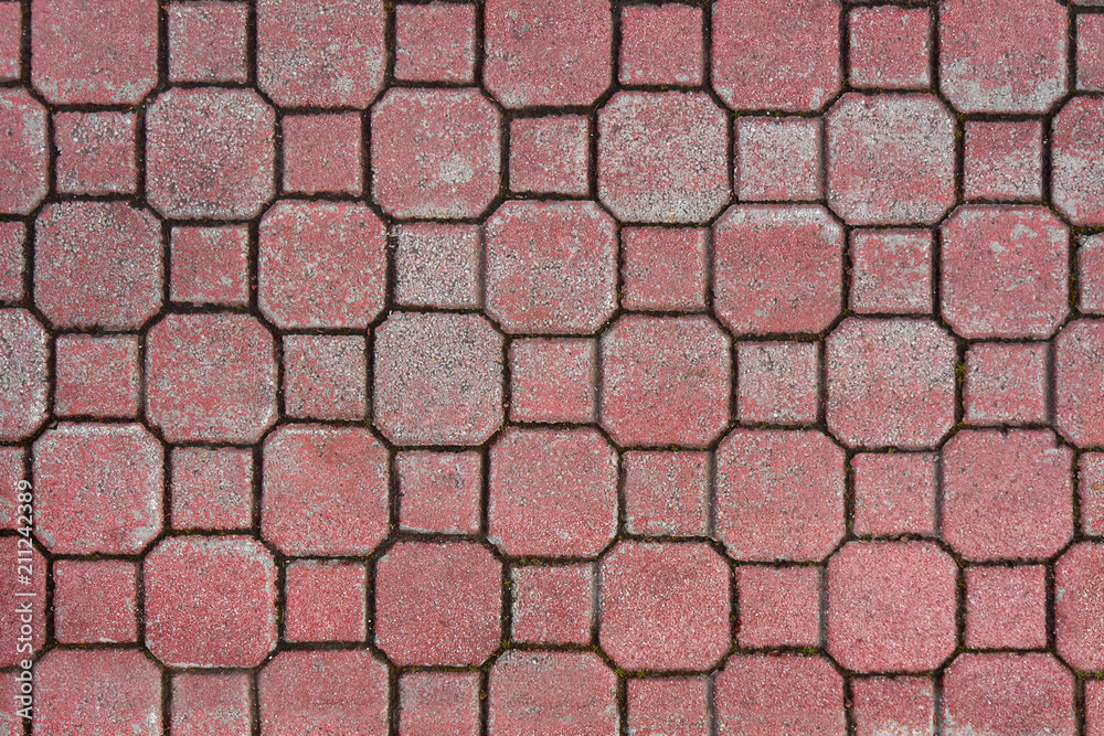 Red block street stone walkaway pavment texture in the city Red block street stone walkaway pavment texture in the city