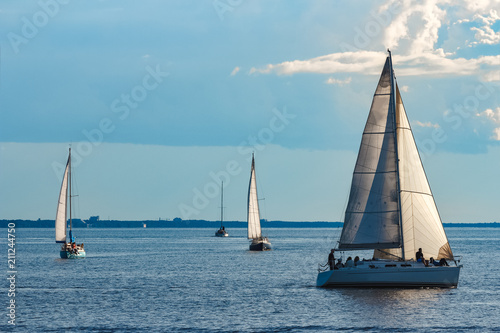 Sailboats traveling by Baltic sea © InfinitumProdux