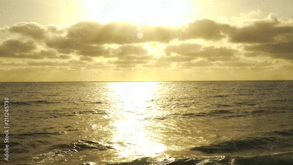 Golden Sky Sunrise on ocean horizon Golden Sky Sunrise on ocean horizon