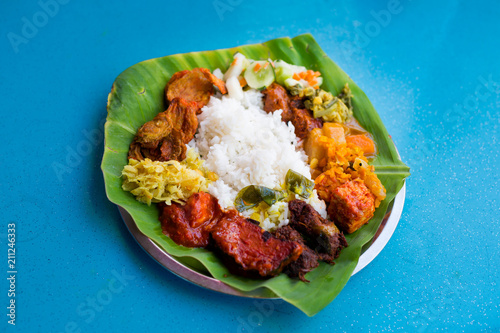 Photography Malaysian banana leaf buffet meal