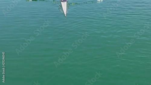 Two young rowers in a racing rower boat, full HD video photo