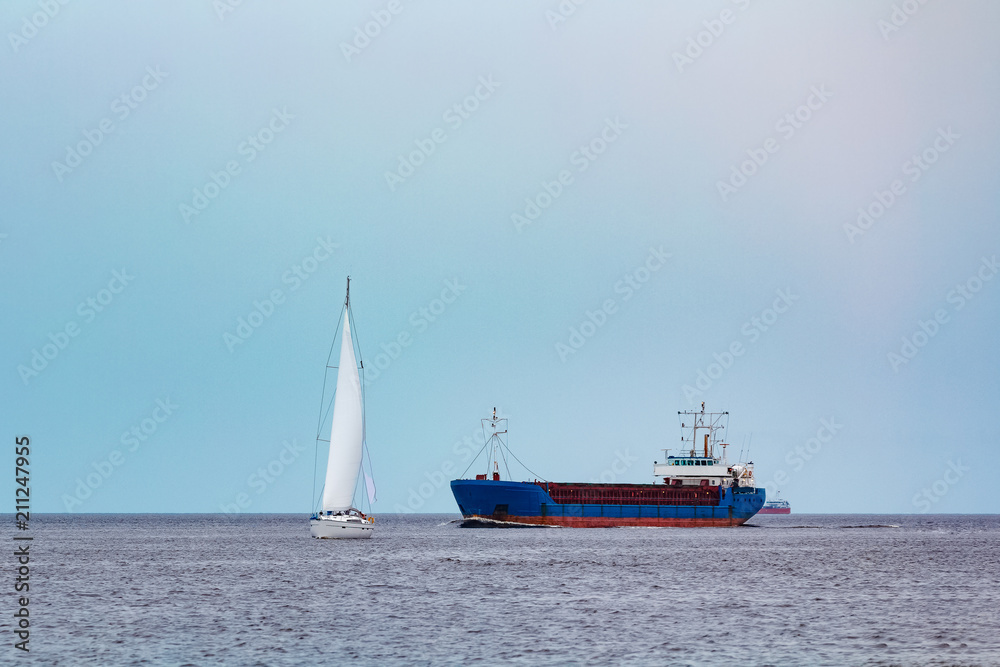 Fototapeta premium Blue cargo ship underway