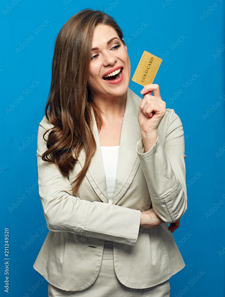 Smiling woman bank employee showing credit card. Smiling woman bank employee showing credit card.