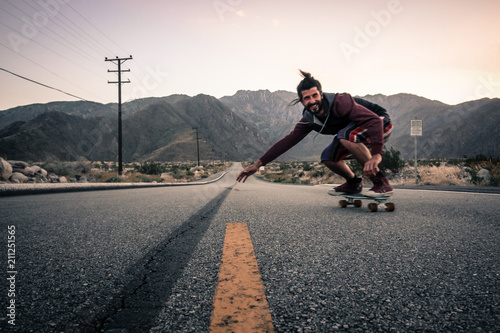 downhill skateboarding in the mountains in america photo
