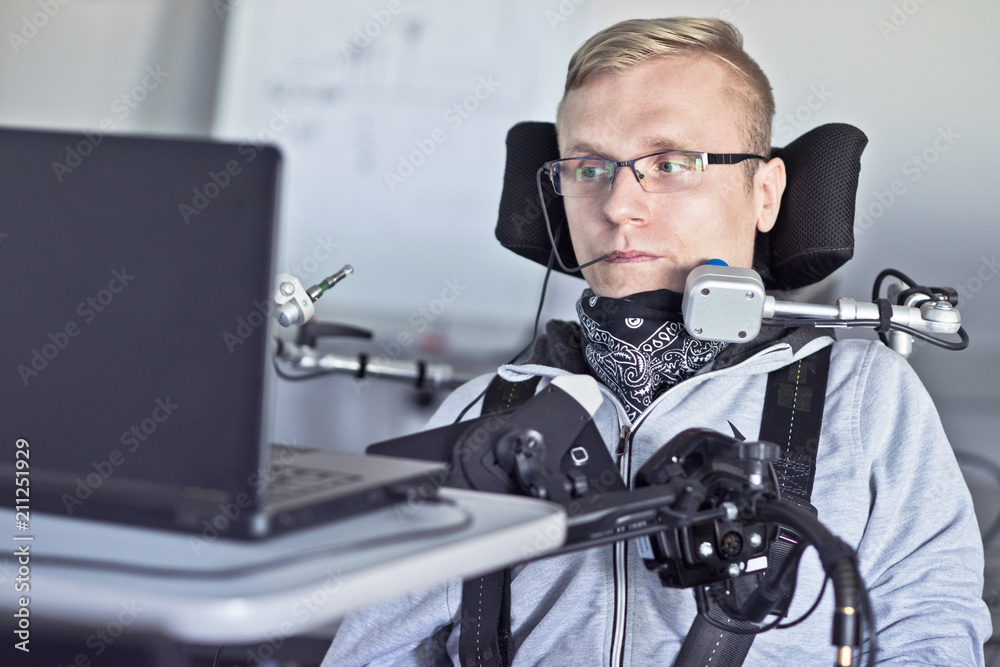 Disabled student in class room. - obrazy, fototapety, plakaty 