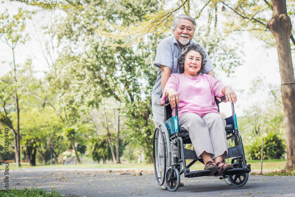 Happy elderly couple with lifestyle after retiree concept. Lovely asian seniors couple embracing together in the park in the morning. Happy elderly couple with lifestyle after retiree concept. Lovely asian seniors couple embracing together in the park in the morning.