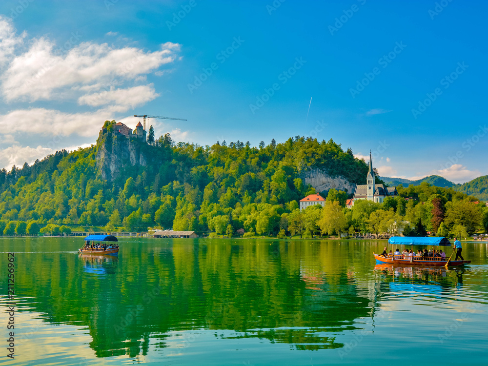 view of the lake of Bled in Slovenia with a typical wooden boats, in Slovenia call 