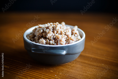 buckwheat boiled in a ceramic bowl photo