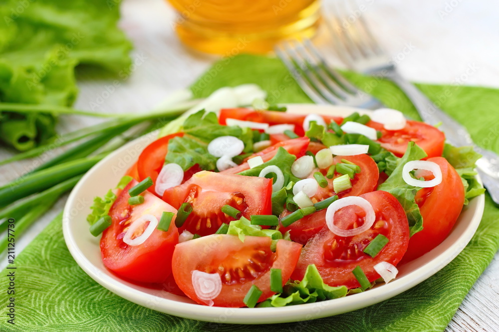 Fresh salad with tomatos and spring onion Fresh salad with tomatos and spring onion