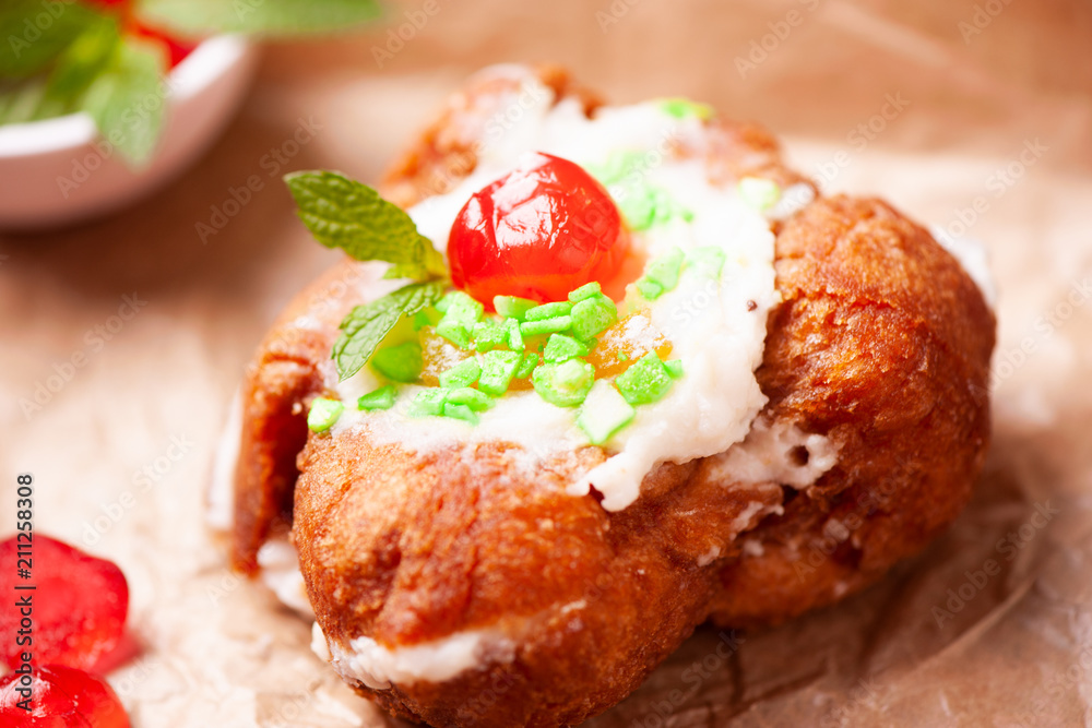 Sfincia di San Giuseppe, tipical sicilian pastry made with fresh ricotta