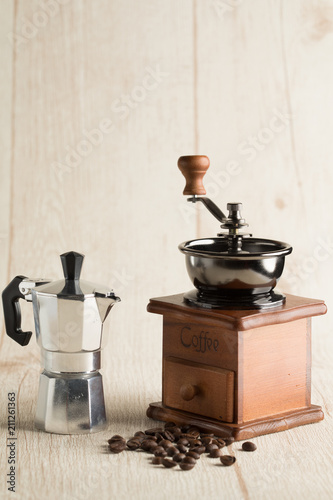 roasted coffee cup and bean with coffee pot vintage style background