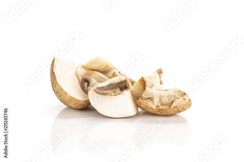 Three brown champignon slices isolated on white background fresh raw mushroom.