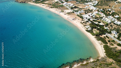 Aerial drone bird's eye view photo of famous turquoise water sandy beach of Psili Amos near port of Gavrio, Andros island, Cyclades, Greece