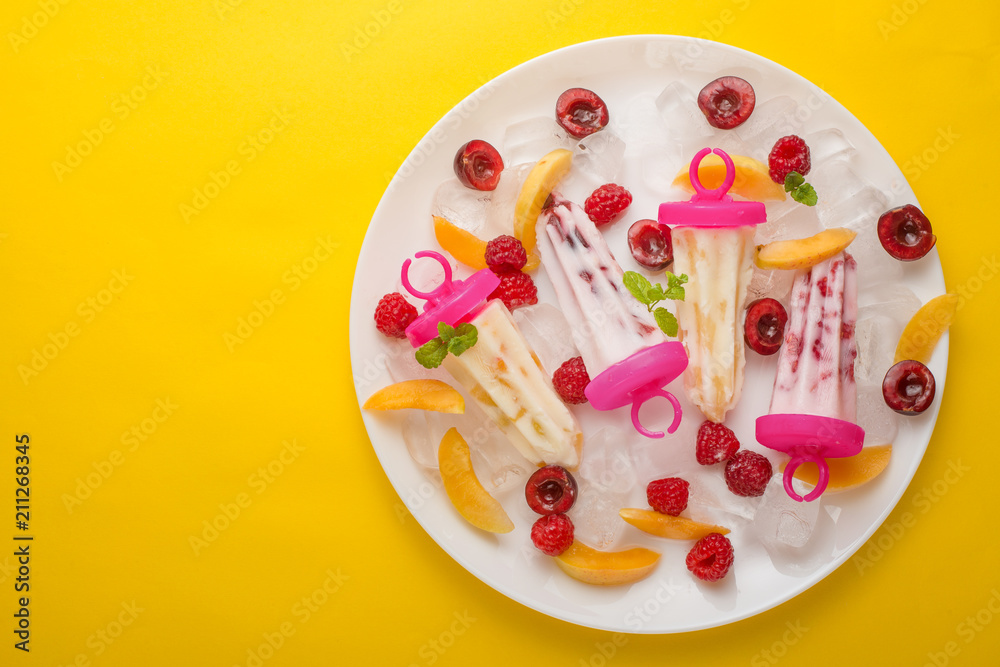 Homemade Eskimony of yogurt, ice cream on sticks, top view, flat lay Homemade Eskimony of yogurt, ice cream on sticks, top view, flat lay