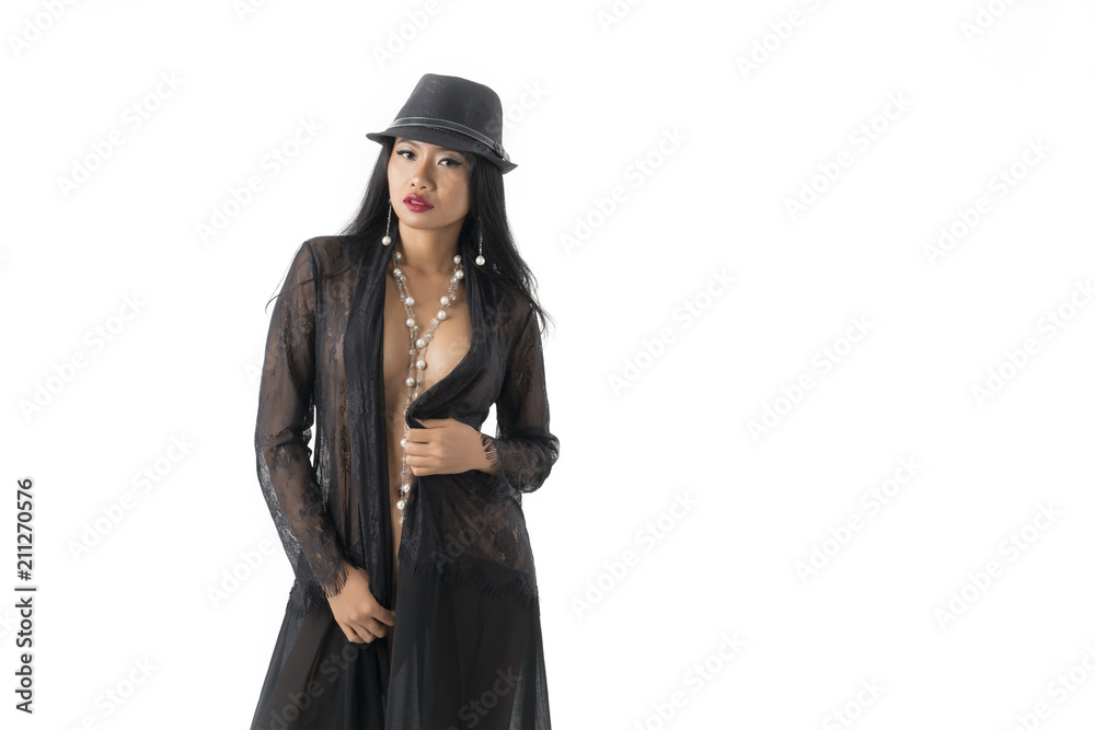 Beautiful sexy young Asian woman in black lace dress , hat and white pearl necklace and earring isolated on white background Beautiful sexy young Asian woman in black lace dress , hat and white pearl necklace and earring isolated on white background