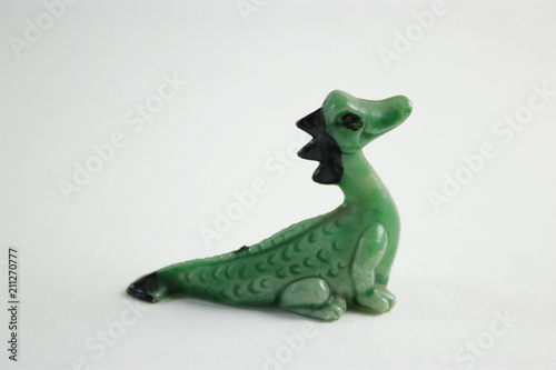 Green and cute toy dragon
