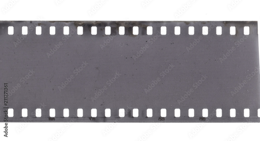 Strip of old film with dust and scratches isolated