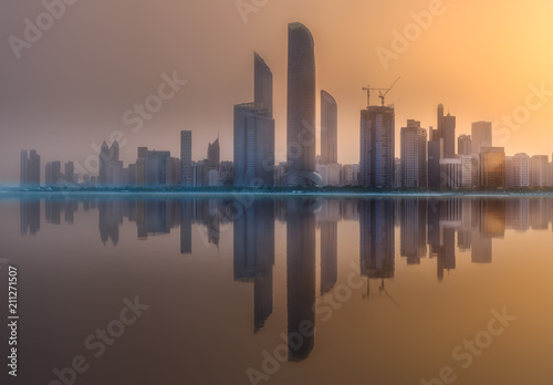 View of Abu Dhabi Skyline at sunset  UAE