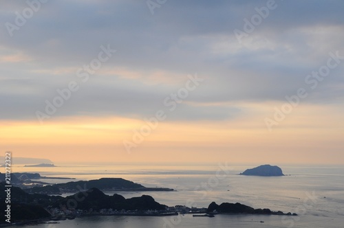 Beautiful sunset and night view of coastline at evening in Jiufen, Taipei, Taiwan