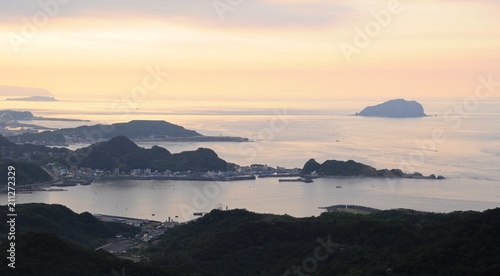 Beautiful sunset and night view of coastline at evening in Jiufen, Taipei, Taiwan