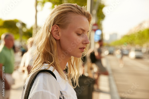 A girl crossing the road in Barcelona photo