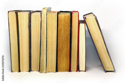 a lot of old books on a light background
