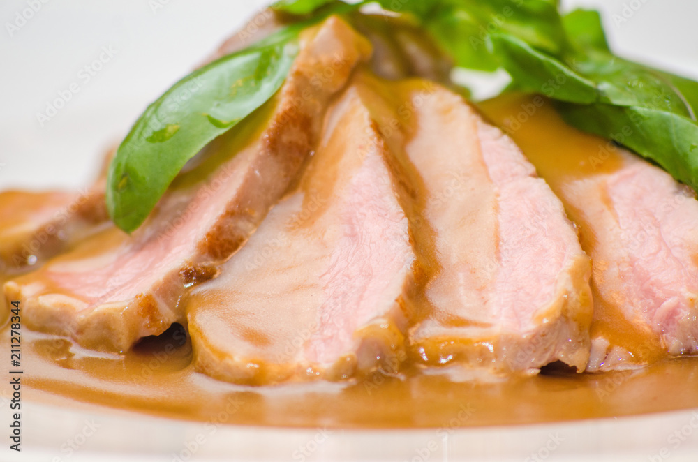 Meat sous vide on a plate with sauce Meat sous vide on a plate with sauce