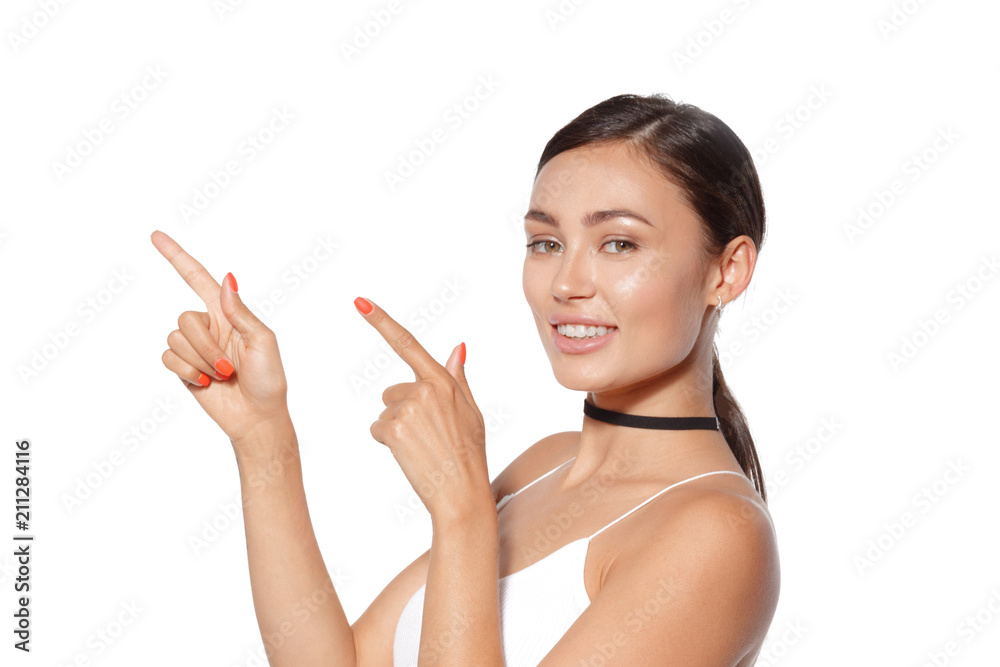 Beauty Woman Portrait. Beautiful Spa Girl showing empty copy space Beauty Woman Portrait. Beautiful Spa Girl showing empty copy space