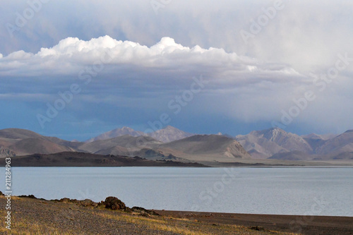 Western Tibet. Sacred lake Dangra (Dang Ra Gyu Tso) in summer evening in cloudy weather