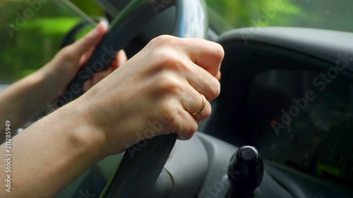 Wallpaper Mural women's hands control the car.close-up Torontodigital.ca