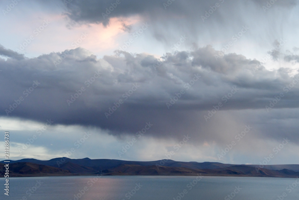 Western Tibet. Sacred lake Dangra (Dang Ra Gyu Tso) in summer in cloudy weather at twilight