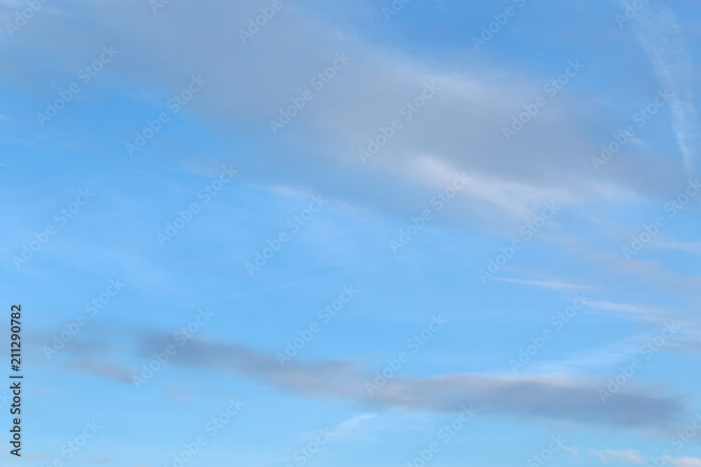 Light blue sky with one cloud at summer day