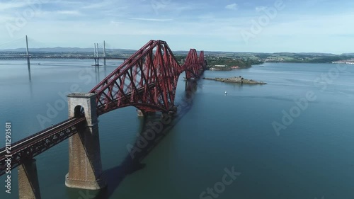 4K aerial footage of the iconic Victorian cantilever railway bridge across the Firth of Forth near Edinburgh.