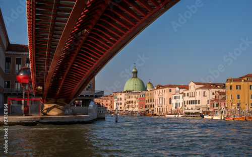 The Constitution bridge or Ponte Della Costituzione is the fourth bridge over the Grand canal in Venice. It is distinguished by the red color and openwork metal construction
