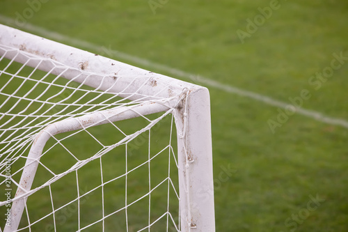 Close up of soccer (football) goal with soccer field